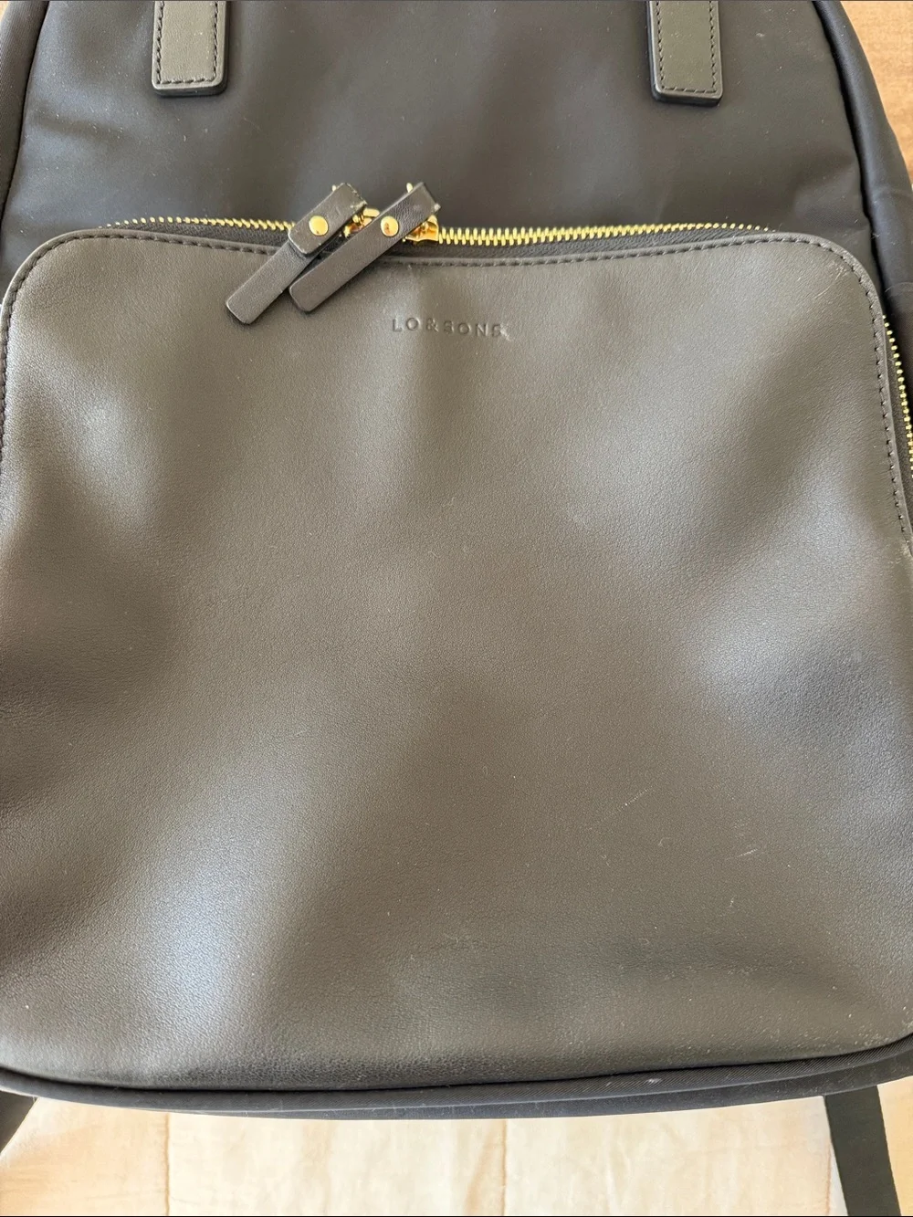 Lo & Sons Rowledge Black Backpack with Gold Hardware